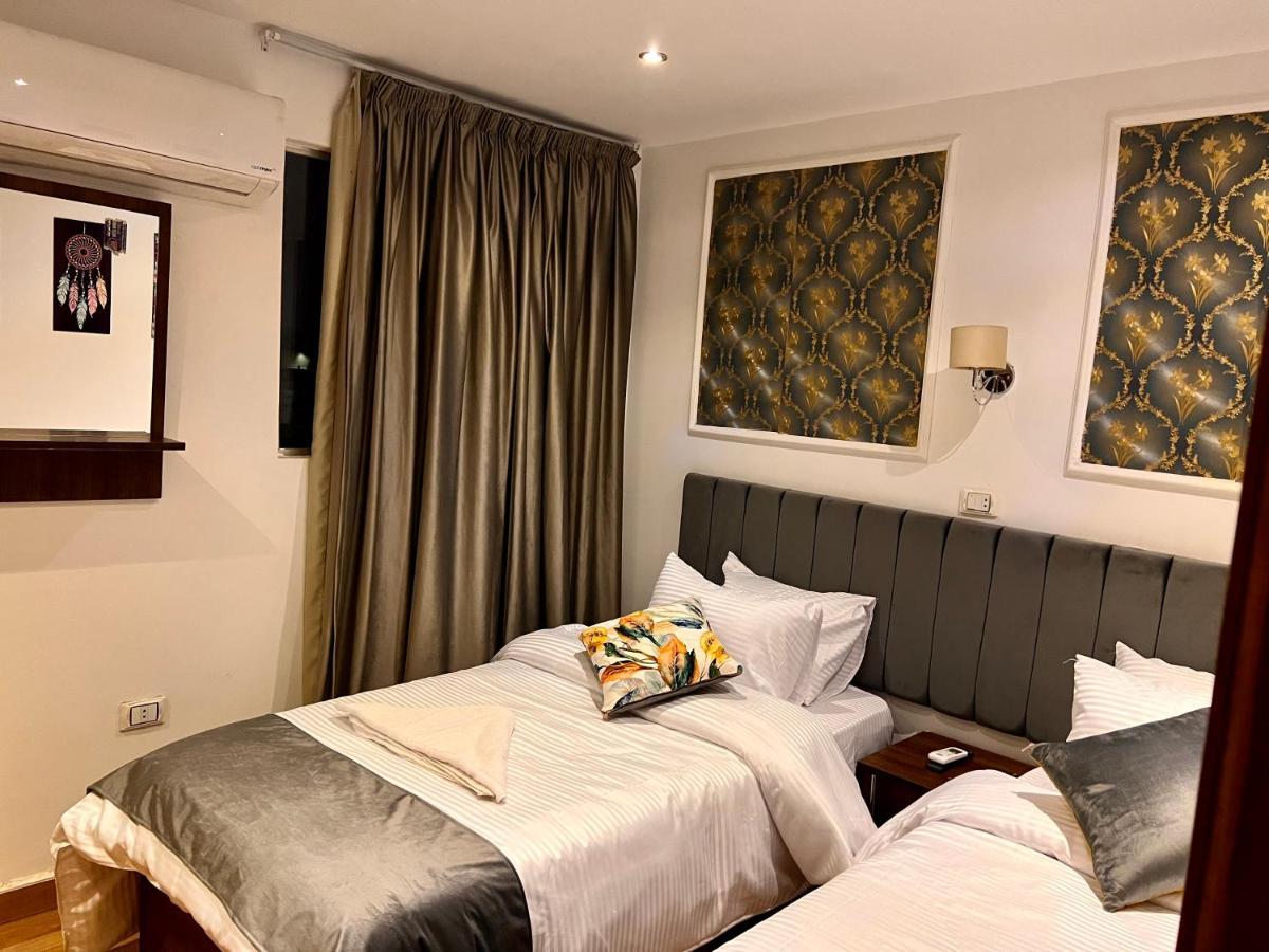 Grand Pyramids Inn Kafret el-Gabal Extérieur photo