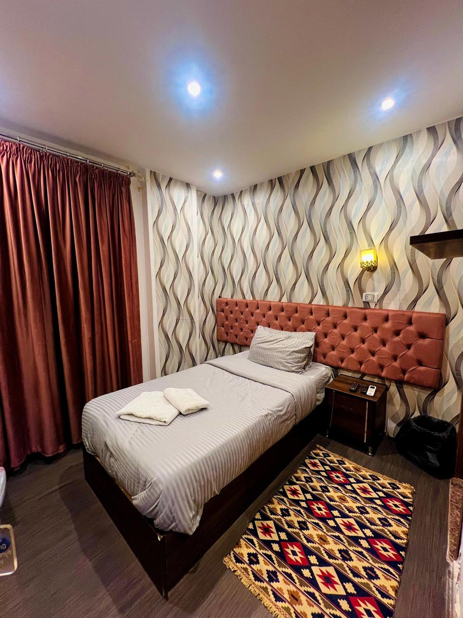 Grand Pyramids Inn Kafret el-Gabal Extérieur photo