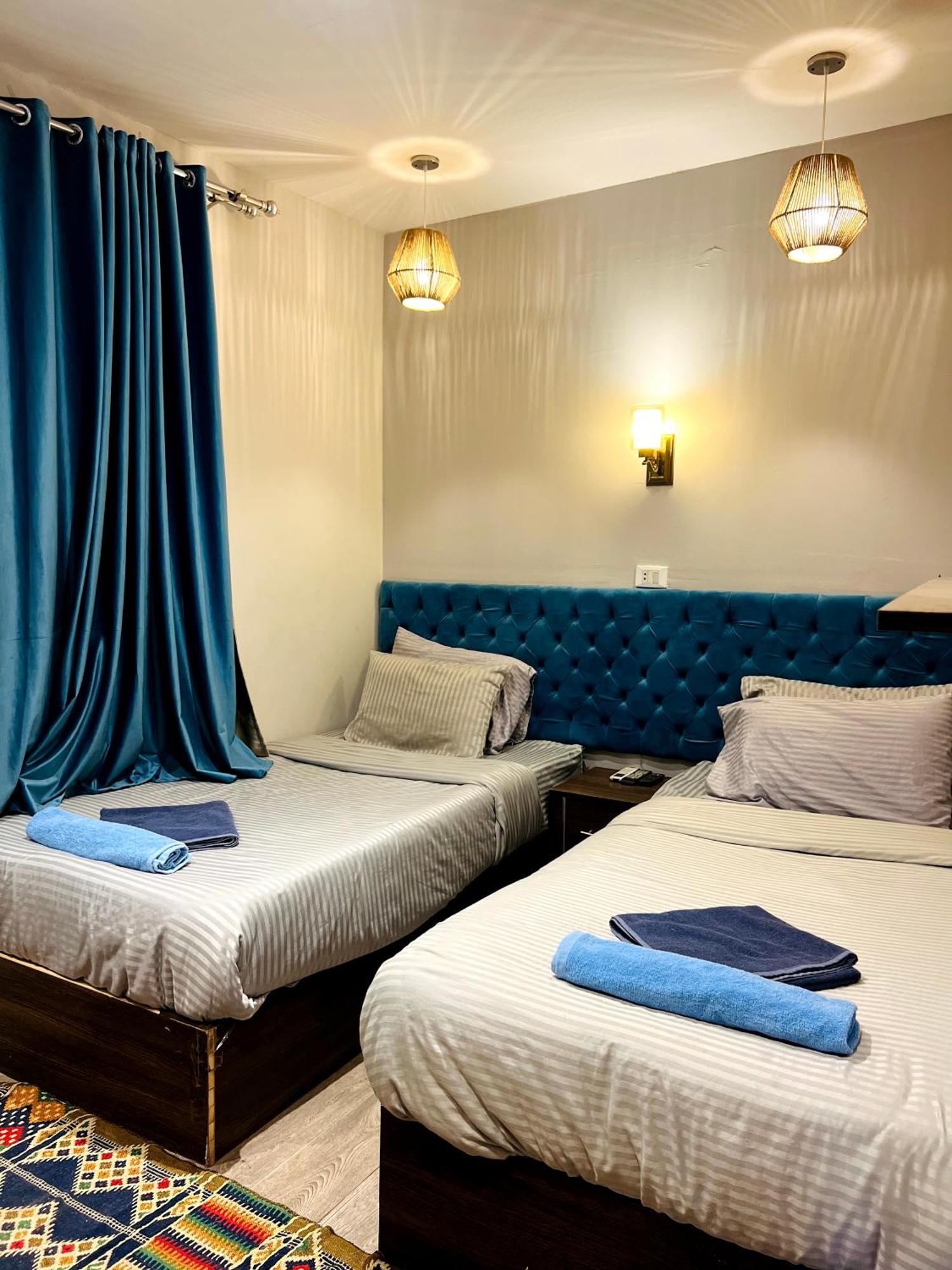 Grand Pyramids Inn Kafret el-Gabal Extérieur photo